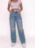 Pantalón Jean Clarito Rotos Oversize — puesto